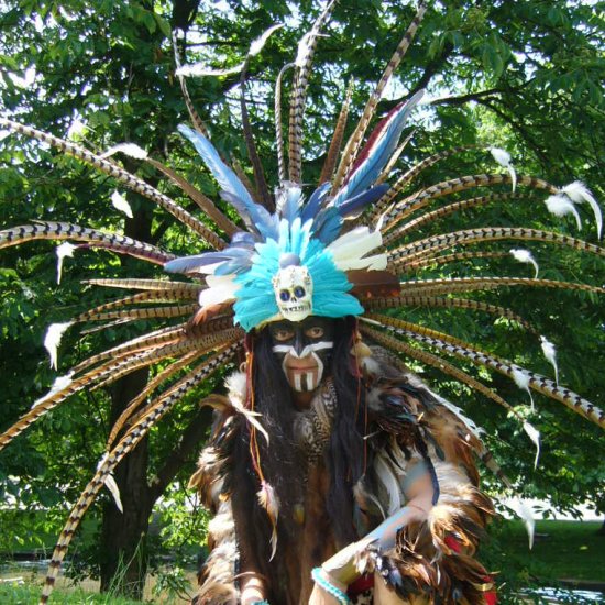 A Maya storyteller with authentic headdress.