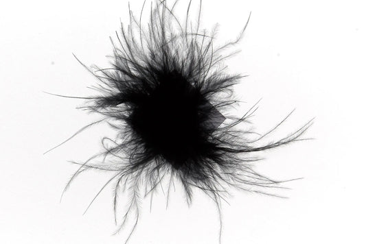 Pompon con etiqueta negra 3cm