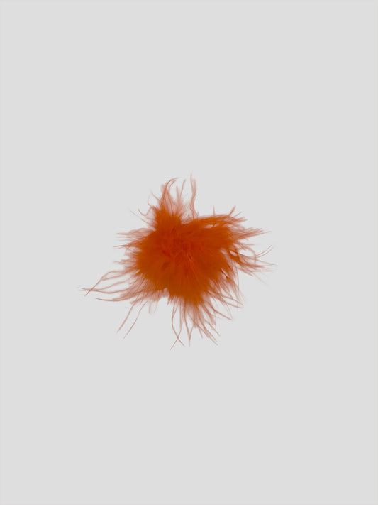 Pompon met stickertje oranje 3cm